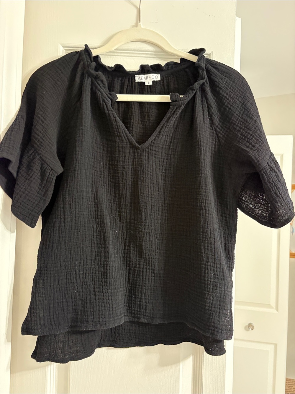 AEMI & CO Black Textured Gauze V-Neck Blouse